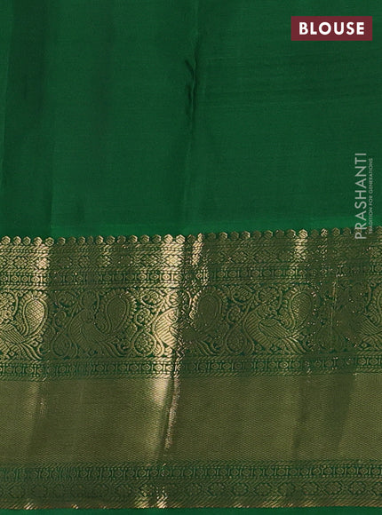 Pure kanchipuram silk saree cream and green with zari woven buttas and long rich zari woven korvai border