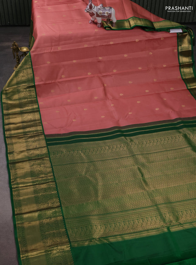 Pure kanchipuram silk saree dark peach and green with zari woven buttas and long rich zari woven korvai border