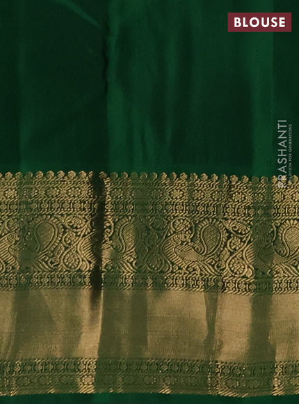 Pure kanchipuram silk saree dark peach and green with zari woven buttas and long rich zari woven korvai border