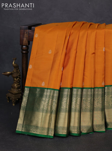 Pure kanchipuram silk saree dark mustard and green with zari woven buttas and long rich zari woven korvai border