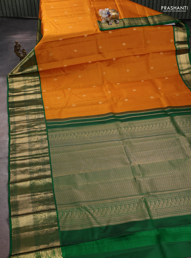 Pure kanchipuram silk saree dark mustard and green with zari woven buttas and long rich zari woven korvai border