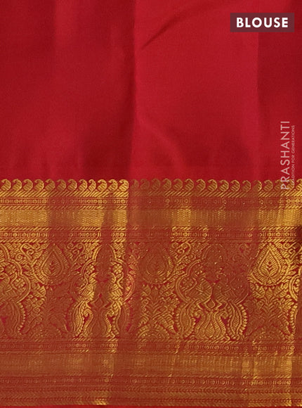 Pure kanchipuram silk saree dual shade of bluish green and dual shade of orange with zari woven buttas and long rich zari woven korvai border