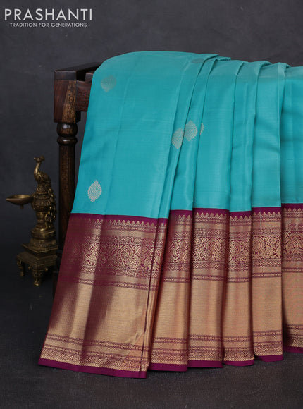 Pure kanchipuram silk saree teal blue and purple with zari woven buttas and long rich zari woven korvai border