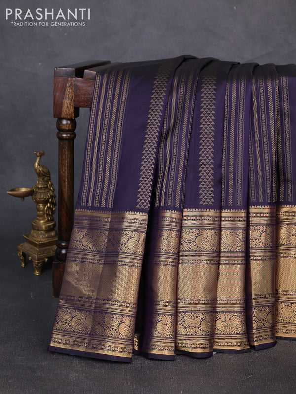 Pure kanchipuram silk saree dark blue and mild peach pink with allover zari weaves and long rich zari woven border