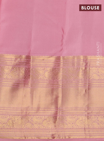 Pure kanchipuram silk saree dark blue and mild peach pink with allover zari weaves and long rich zari woven border