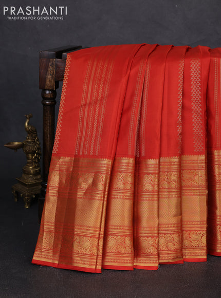 Pure kanchipuram silk saree rustic orange with allover zari weaves and long rich zari woven border