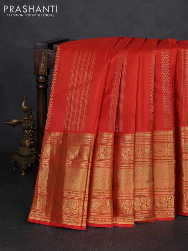 Pure kanchipuram silk saree rustic orange with allover zari weaves and long rich zari woven border