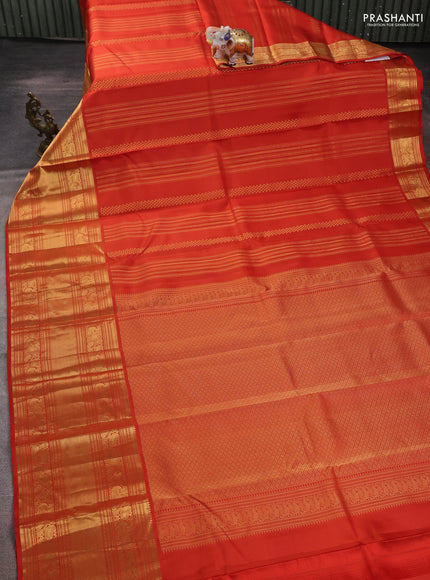Pure kanchipuram silk saree rustic orange with allover zari weaves and long rich zari woven border