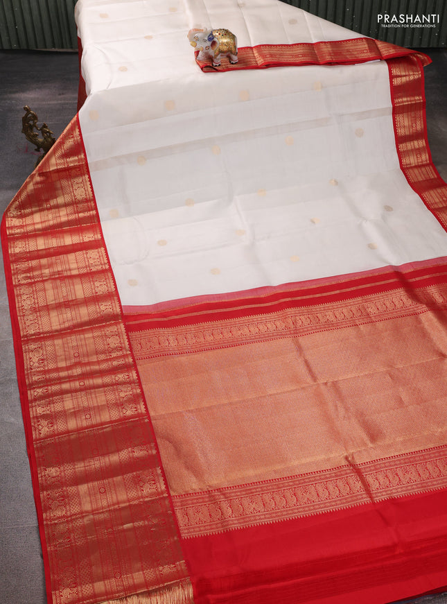 Pure kanchipuram silk saree off white and red with zari woven buttas and long rich zari woven korvai border