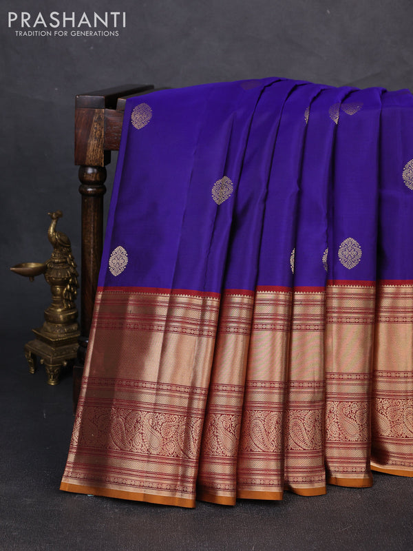 Pure kanchipuram silk saree blue and dark mustard with zari woven buttas and long rich zari woven border