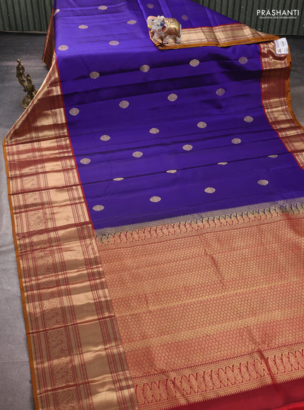 Pure kanchipuram silk saree blue and dark mustard with zari woven buttas and long rich zari woven border