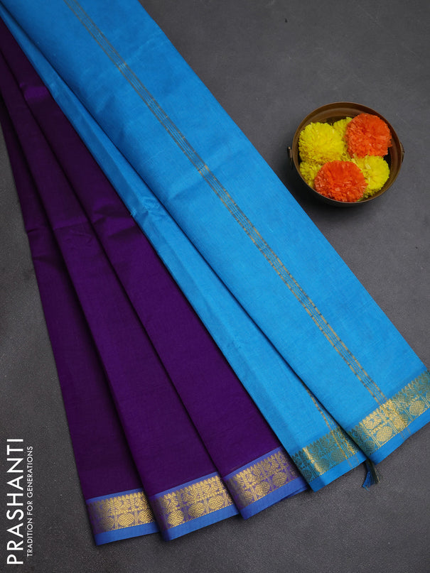 Silk cotton saree purple and light blue with plain body and zari woven border