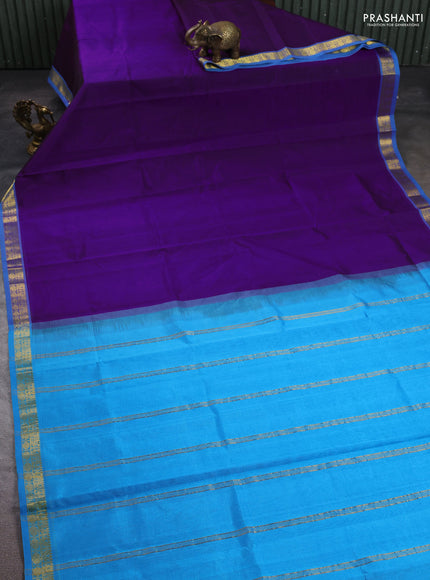 Silk cotton saree purple and light blue with plain body and zari woven border