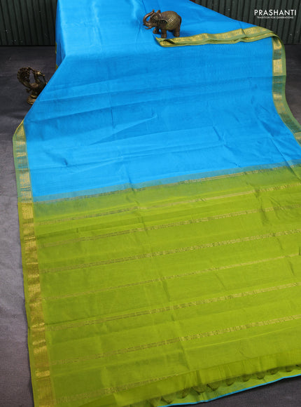 Silk cotton saree light blue and light green with plain body and zari woven border