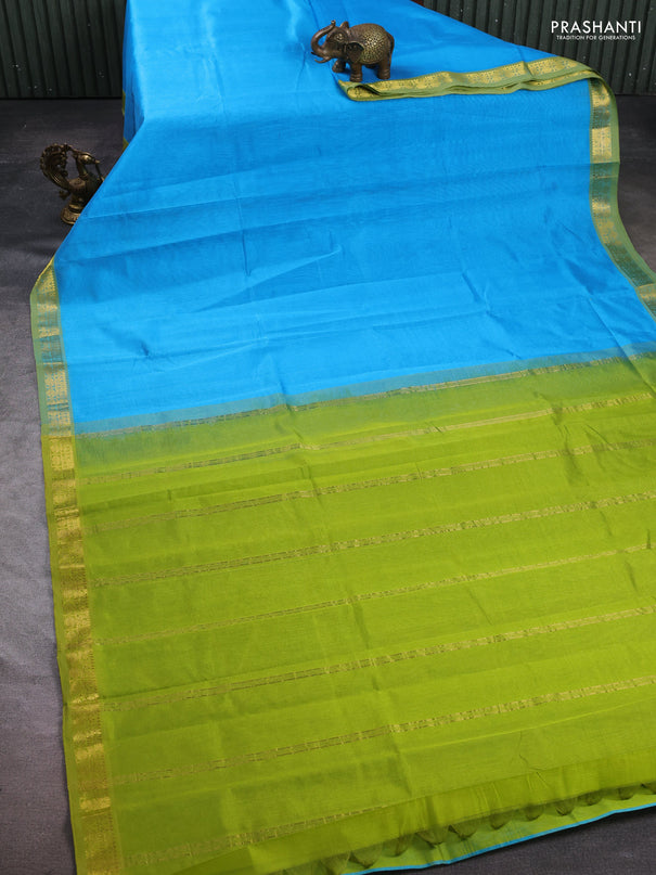 Silk cotton saree light blue and light green with plain body and zari woven border