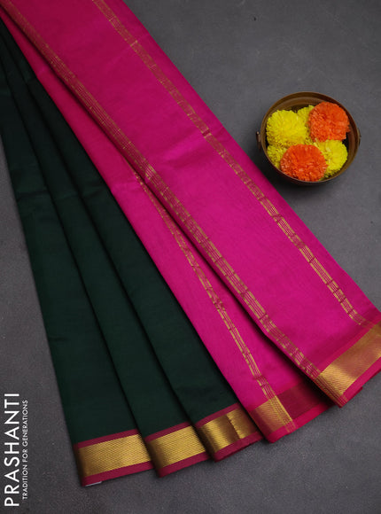 Silk cotton saree bottle green and pink with plain body and zari woven border