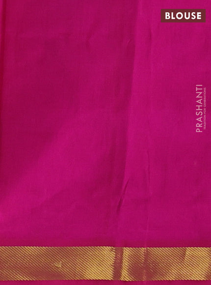 Silk cotton saree bottle green and pink with plain body and zari woven border