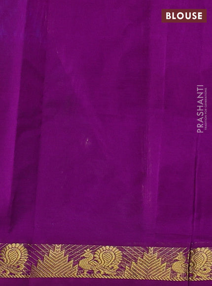 Silk cotton saree dual shade of bluish green and purple with plain body and zari woven border