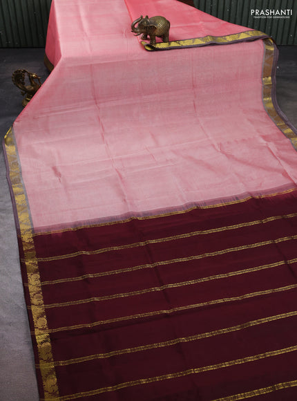 Silk cotton saree mild peach and coffee brown with plain body and zari woven border