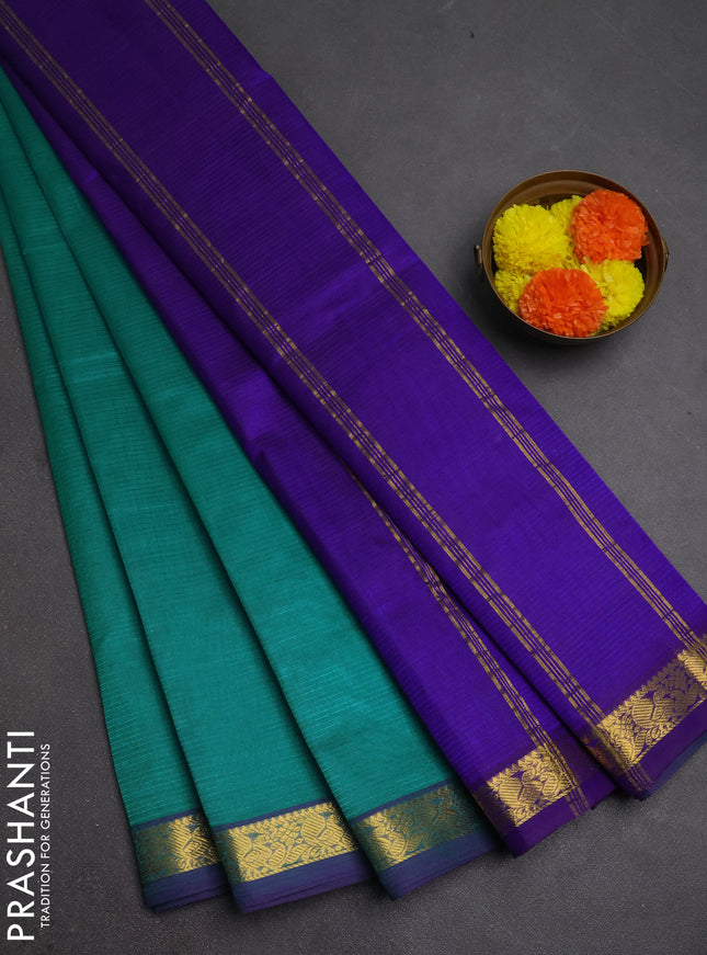 Silk cotton saree teal green and blue with allover stripe pattern and zari woven border