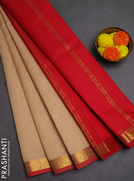 Silk cotton saree beige and red with plain body and zari woven border