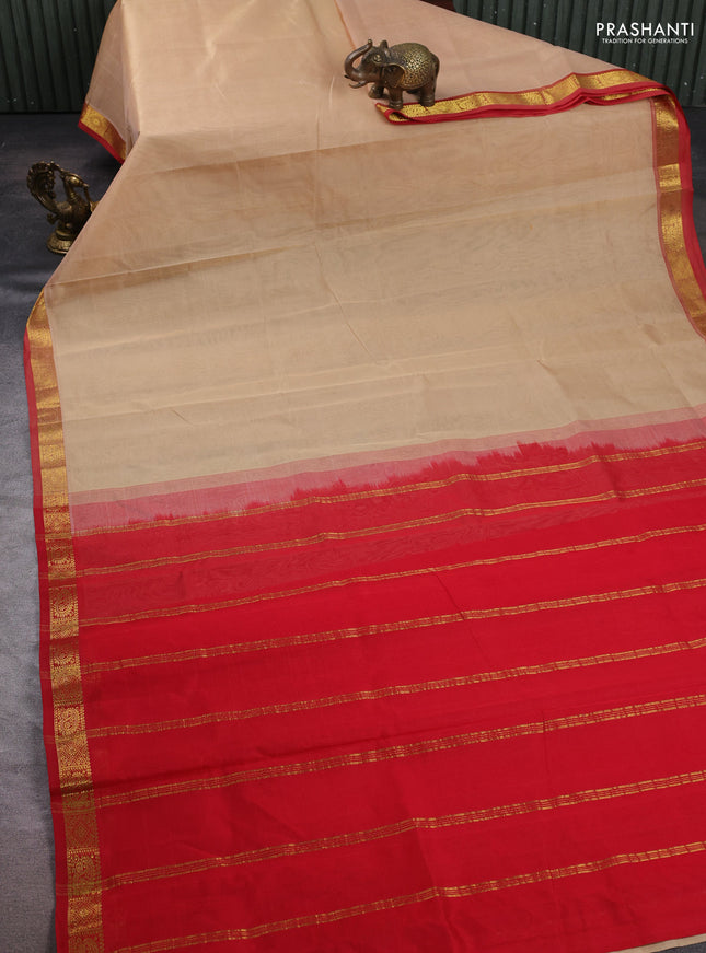 Silk cotton saree beige and red with plain body and zari woven border