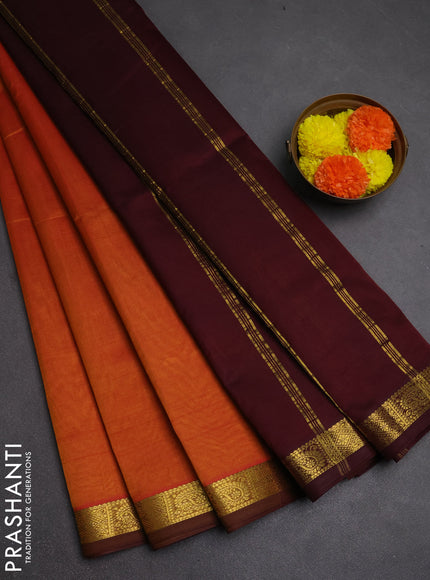 Silk cotton saree honey shade and coffee brown with plain body and zari woven border