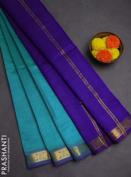 Silk cotton saree light blue and violet with plain body and zari woven border