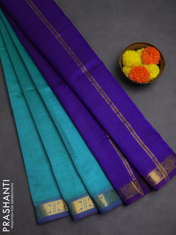 Silk cotton saree light blue and violet with plain body and zari woven border