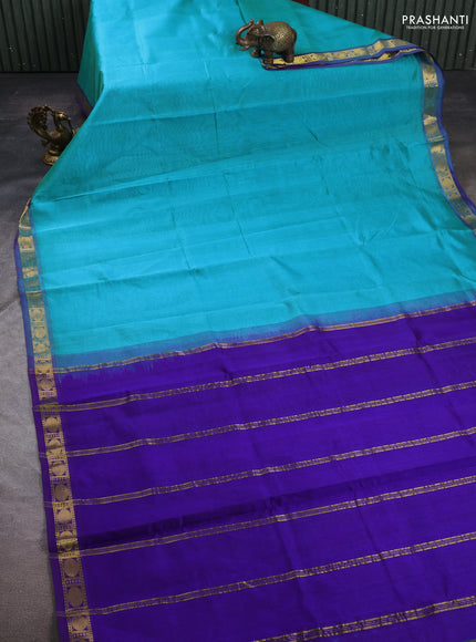 Silk cotton saree light blue and violet with plain body and zari woven border