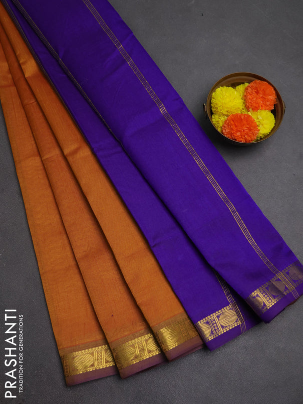 Silk cotton saree dark mustard and violet with plain body and zari woven border