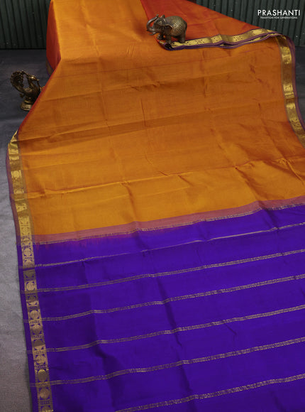 Silk cotton saree dark mustard and violet with plain body and zari woven border