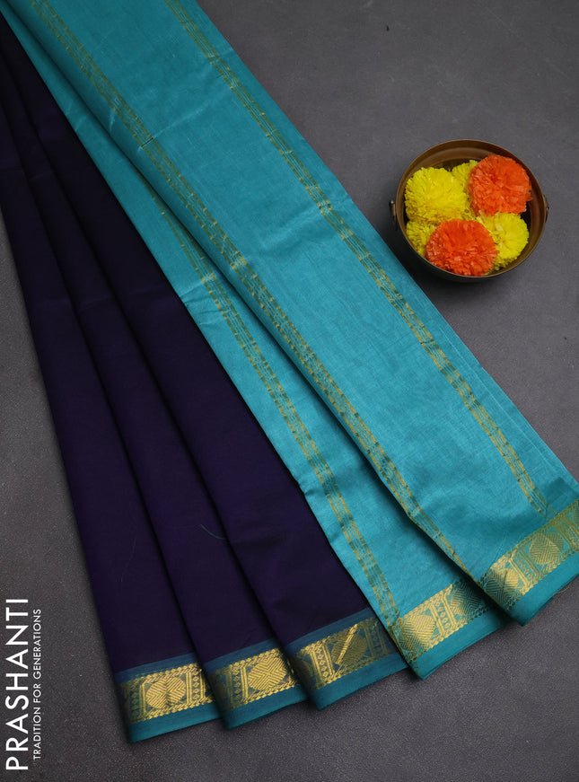 Silk cotton saree navy blue and teal blue with plain body and zari woven border