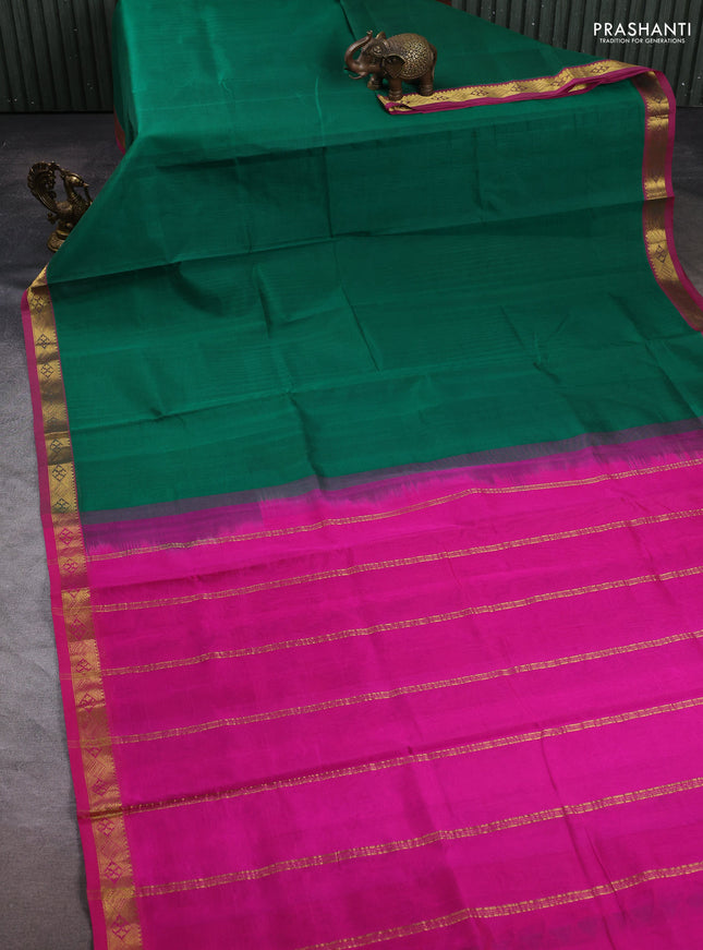 Silk cotton saree green and pink with plain body and zari woven border