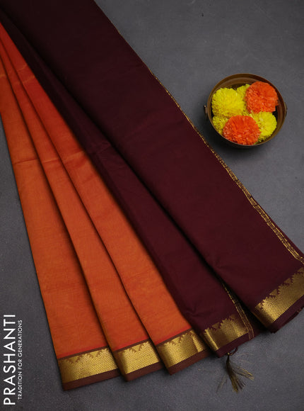 Silk cotton saree sunset orange and coffee brown with plain body and zari woven border