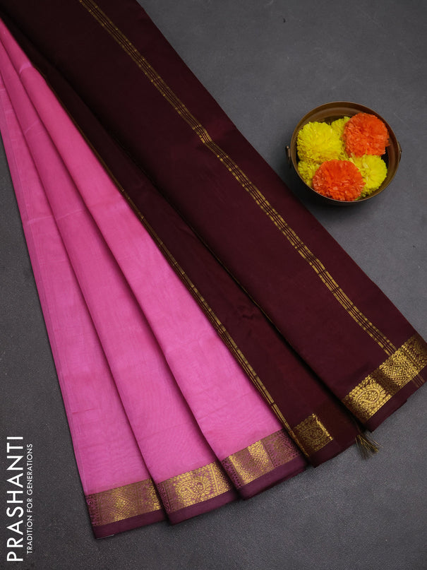 Silk cotton saree light pink and coffee brown with plain body and zari woven border