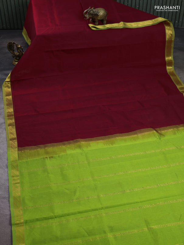 Silk cotton saree maroon and light green with plain body and zari woven border
