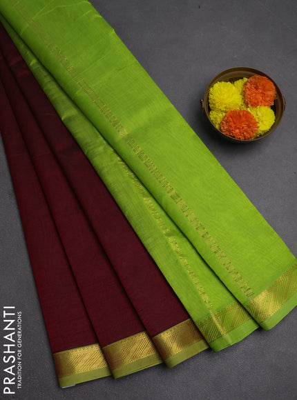 Silk cotton saree maroon and light green with plain body and zari woven border