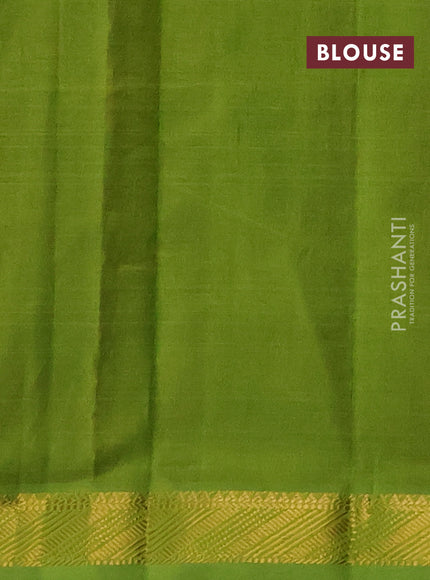 Silk cotton saree maroon and light green with plain body and zari woven border