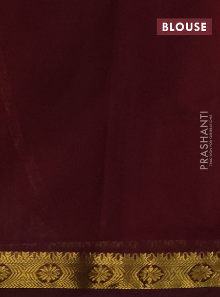 Silk cotton saree peach shade and deep maroon with plain body and zari woven border