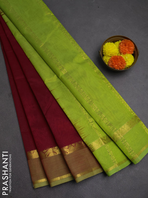 Silk cotton saree maroon and light green with plain body and rettapet zari woven border