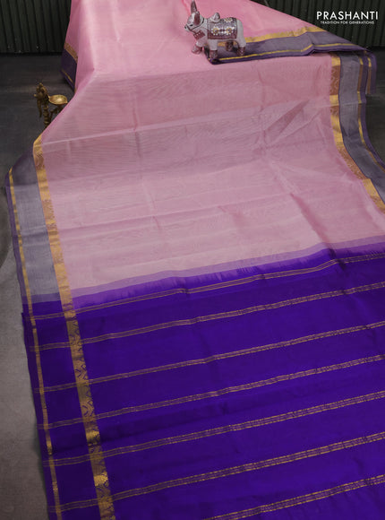 Silk cotton saree light pink and violet with plain body and rettapet zari woven border