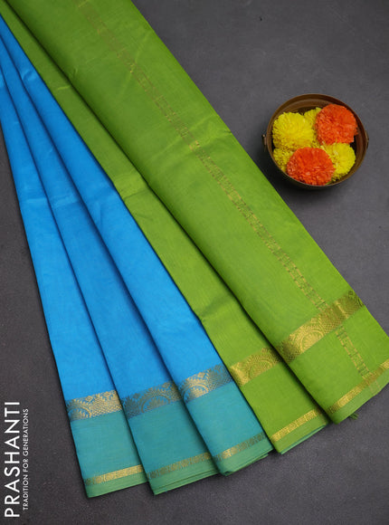 Silk cotton saree blue and light green with plain body and rettapet zari woven border