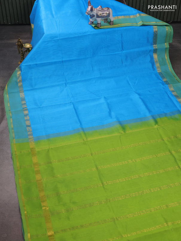 Silk cotton saree blue and light green with plain body and rettapet zari woven border