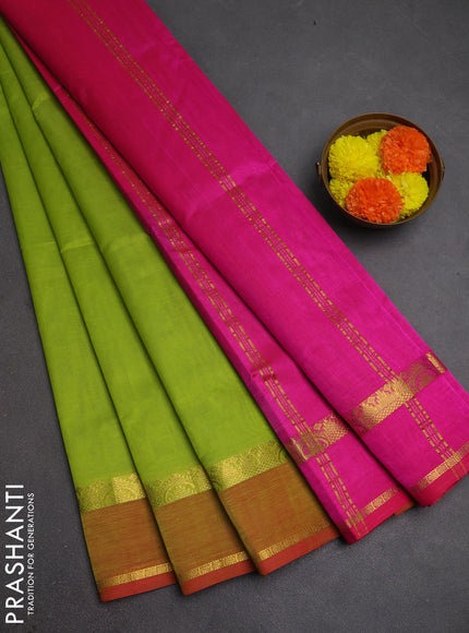 Silk cotton saree light green and pink with plain body and rettapet zari woven border