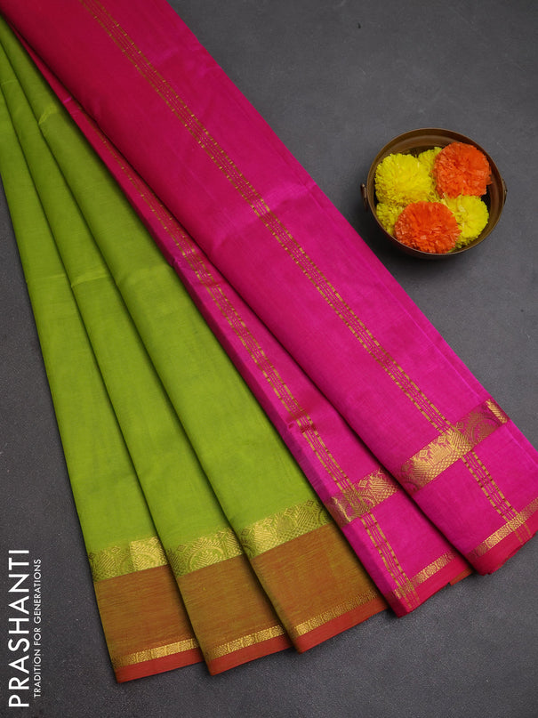 Silk cotton saree light green and pink with plain body and rettapet zari woven border
