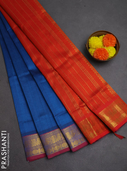 Silk cotton saree cs blue and rustic orange with plain body and zari woven border