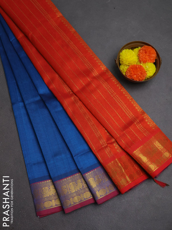 Silk cotton saree cs blue and rustic orange with plain body and zari woven border