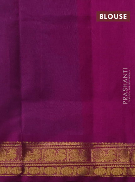 Silk cotton saree teal blue and purple with plain body and zari woven border
