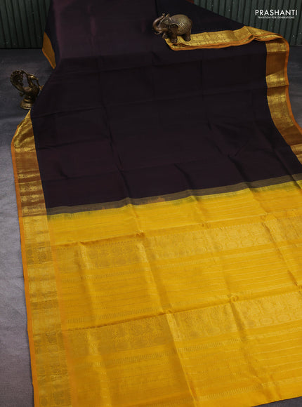 Silk cotton saree deep coffee brown and mango yellow with plain body and zari woven border